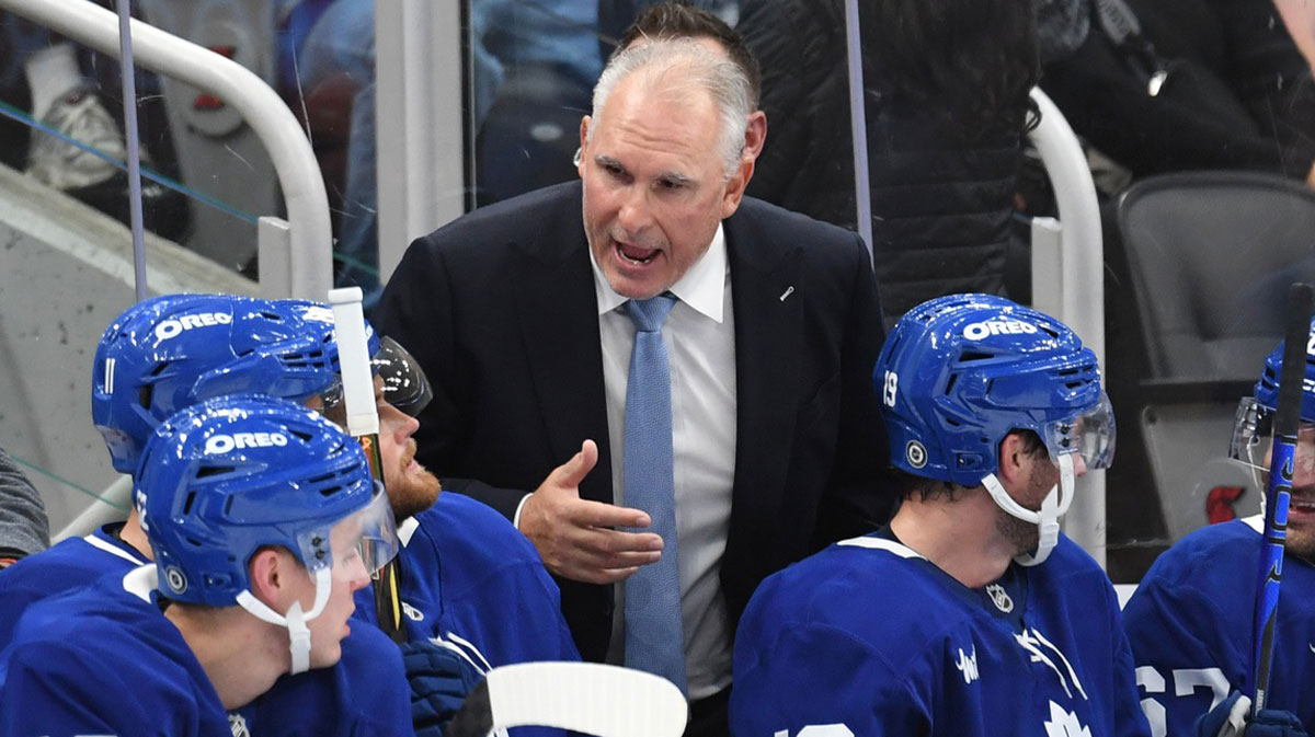 Toronto Maple Leafs head coach Craig Berube speaks with his players in the second period against the Ottawa Senators at Scotiabank Arena