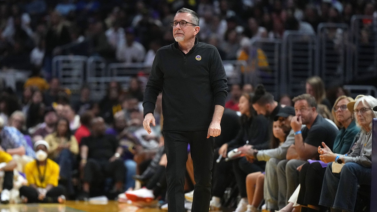 LA Sparks coach Curt Miller reacts against the New York Liberty in the second half at Crypto.com Arena.