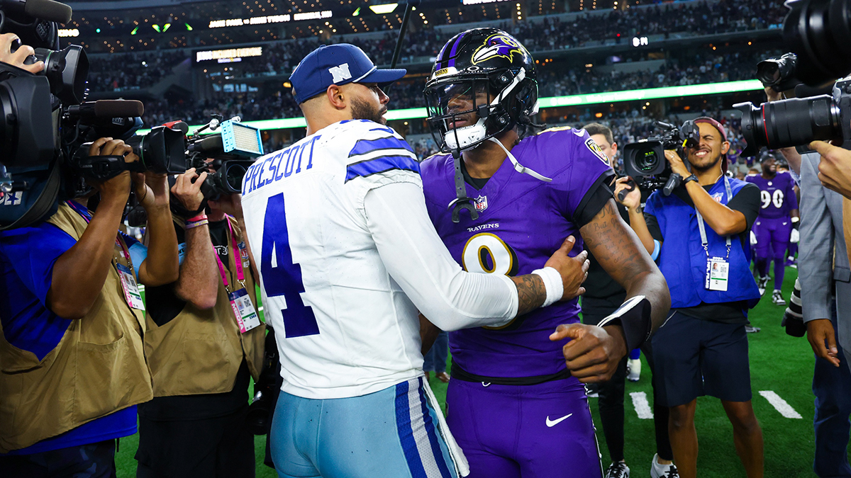 Sep 22, 2024; Arlington, Texas, USA; Dallas Cowboys quarterback Dak Prescott (4) hugs Baltimore Ravens quarterback Lamar Jackson (8) after the game at AT&T Stadium. Mandatory Credit: Kevin Jairaj-Imagn Images