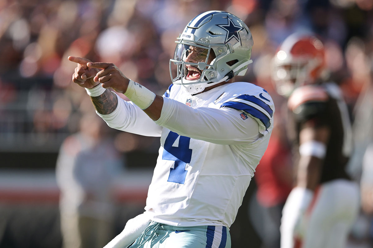 Dallas Cowboys quarterback Dak Prescott (4) celebrates after a touchdown during the first half against the Cleveland Browns at Huntington Bank Field. 