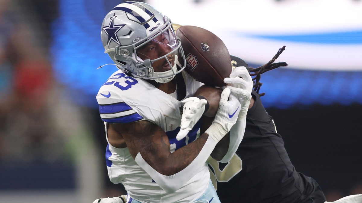 New Orleans Saints linebacker Demario Davis (56) defends a pass against Dallas Cowboys running back Rico Dowdle (23) in the first quarter at AT&T Stadium.