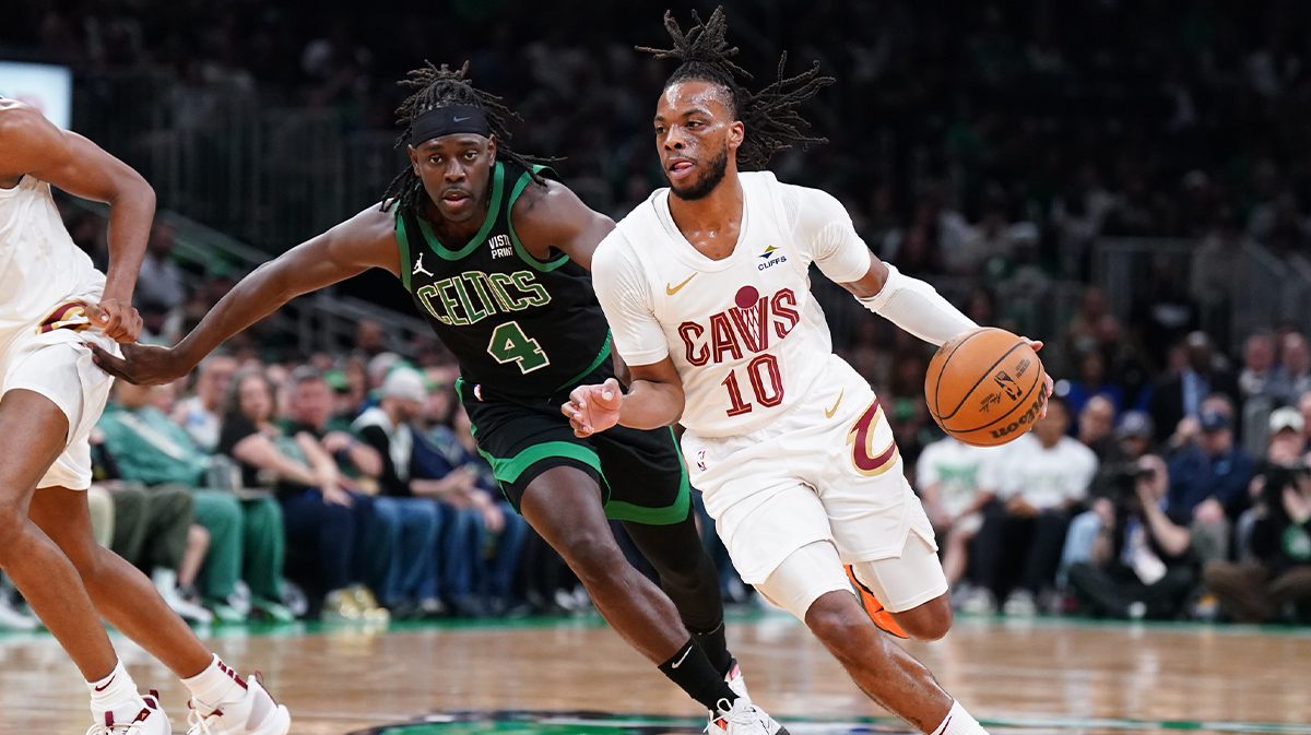 Cleveland Cavaliers guard Darius Garland (10) drives the ball against Boston Celtics guard Jrue Holiday (4) in the first quarter during game five of the second round for the 2024 NBA playoffs at TD Garden.