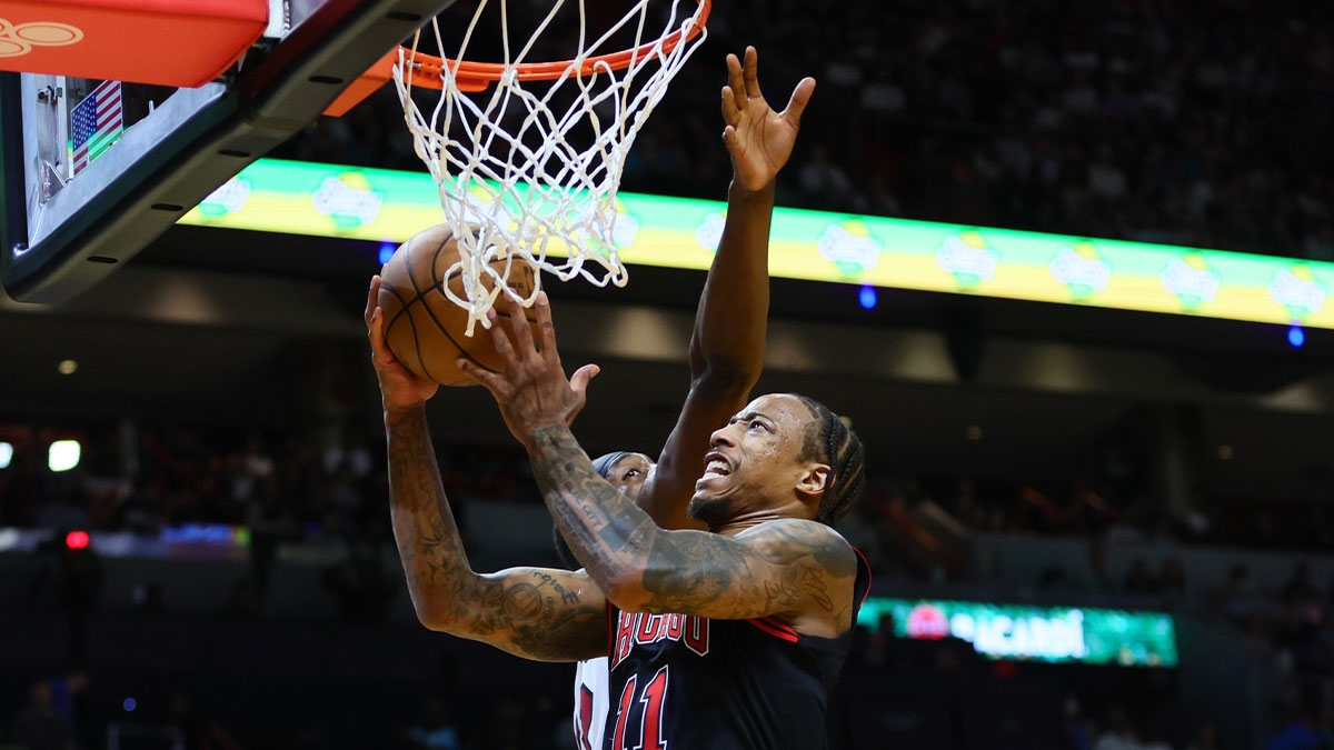 Chicago Bulls forward DeMar DeRozan (11) drives to the basket against Miami Heat center Bam Adebayo (13) in the second quarter during a 2024 NBA Playoffs playoff game at Kaseya Center.