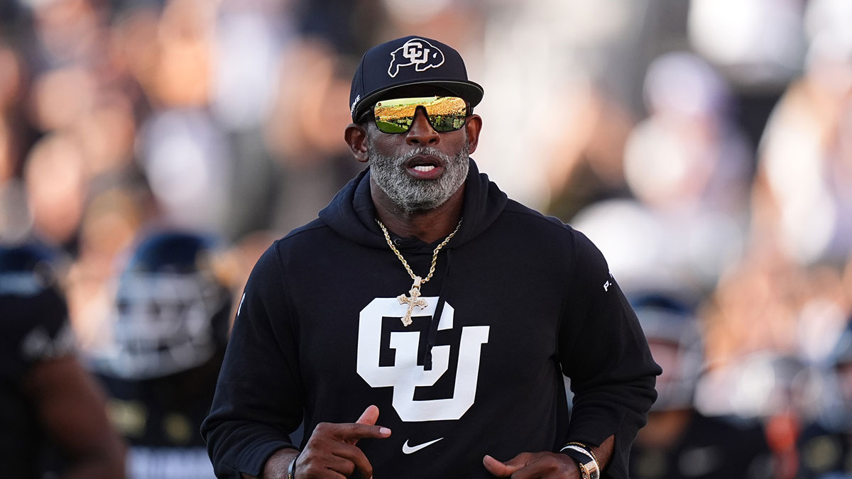 Colorado Buffaloes head coach Deion Sanders runs onto the field before the game against the North Dakota State Bison at Folsom Field.