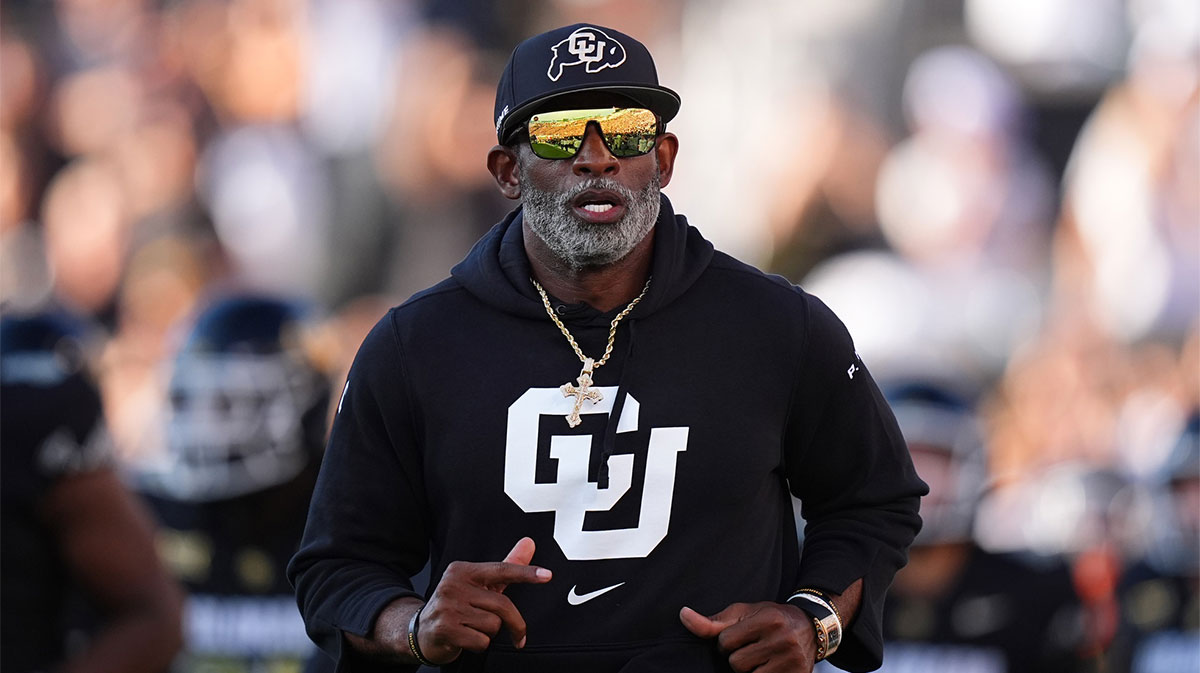 Aug 29, 2024; Boulder, Colorado, USA; Colorado Buffaloes head coach Deion Sanders runs onto the field before the game against the North Dakota State Bison at Folsom Field. Mandatory Credit: Ron Chenoy-USA TODAY Sports