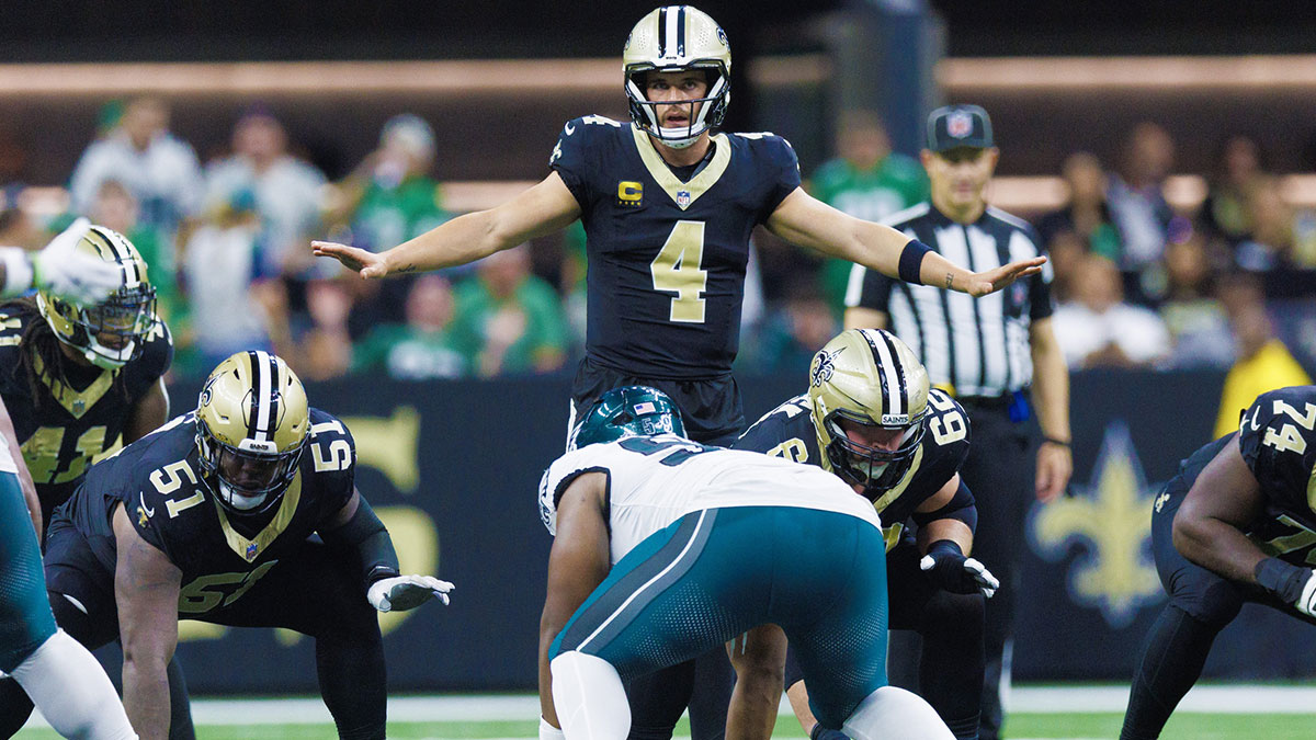 Sep 22, 2024; New Orleans, Louisiana, USA; New Orleans Saints quarterback Derek Carr (4) calls a play at the line against the Philadelphia Eagles during the second half at Caesars Superdome. Mandatory Credit: Stephen Lew-Imagn Images