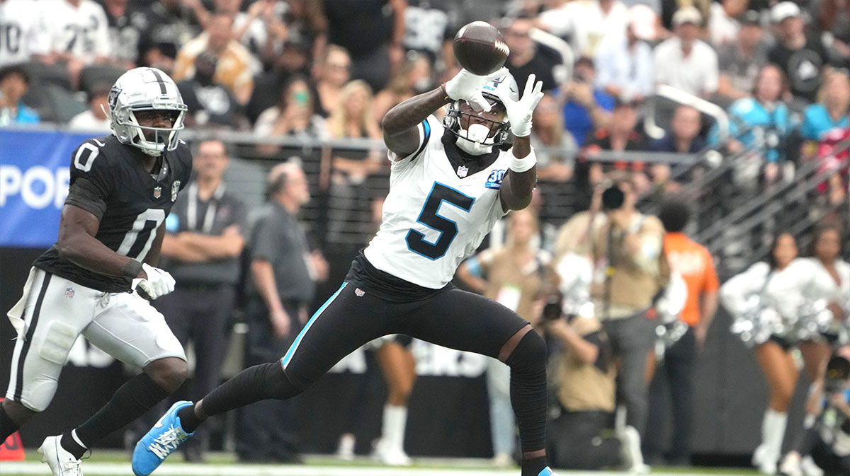 Sep 22, 2024; Paradise, Nevada, USA; Carolina Panthers wide receiver Diontae Johnson (5) catches the ball against Las Vegas Raiders cornerback Jakorian Bennett (0) in the first half at Allegiant Stadium.