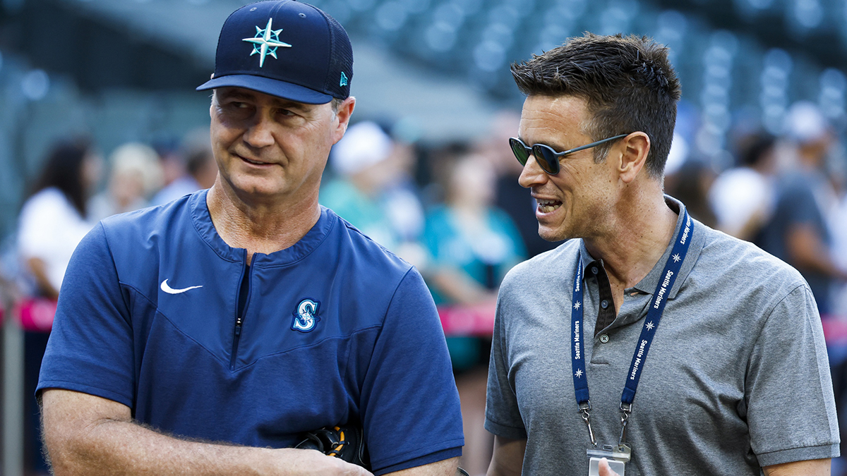 Aug 9, 2022; Seattle, Washington, USA; Seattle Mariners manager Scott Servais, left, and general manger Jerry Dipoto talk during batting practice against the New York Yankees at T-Mobile Park. 