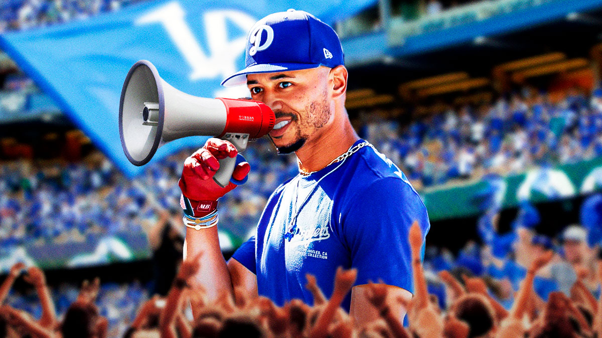Dodgers’ Mookie Betts with a megaphone talking to fans