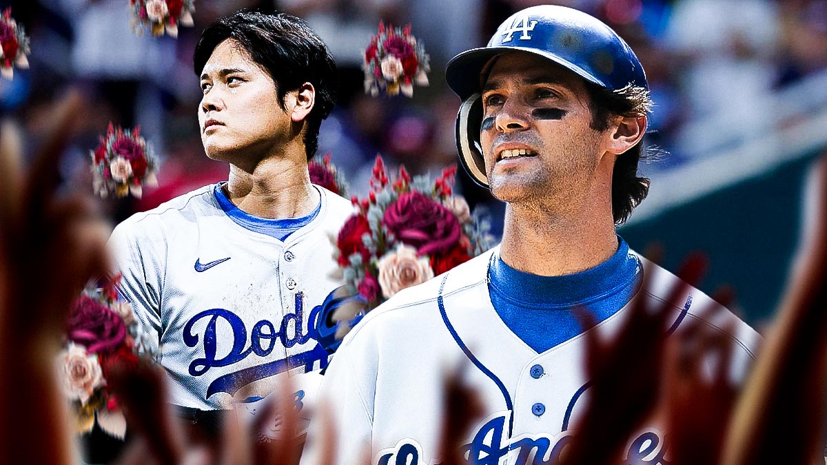 Dodgers' Shawn Green smiling at Shohei Ohtani, with flowers being thrown at Ohtani