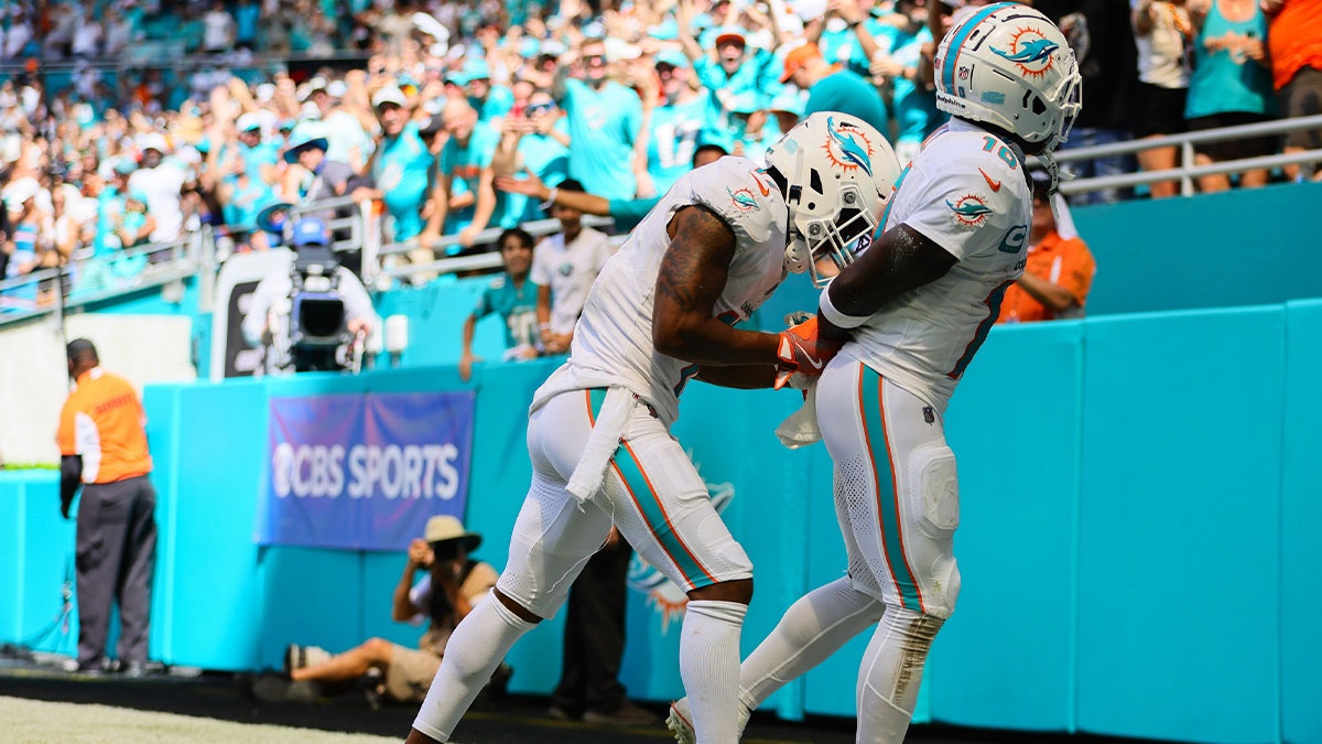 Miami Dolphins wide receiver Tyreek Hill (10) celebrates with wide receiver Jaylen Waddle (17) after scoring a touchdown against the Jacksonville Jaguars during the third quarter at Hard Rock Stadium. 