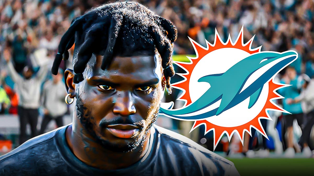 Dolphins' Tyreek Hill looks serious after arrest