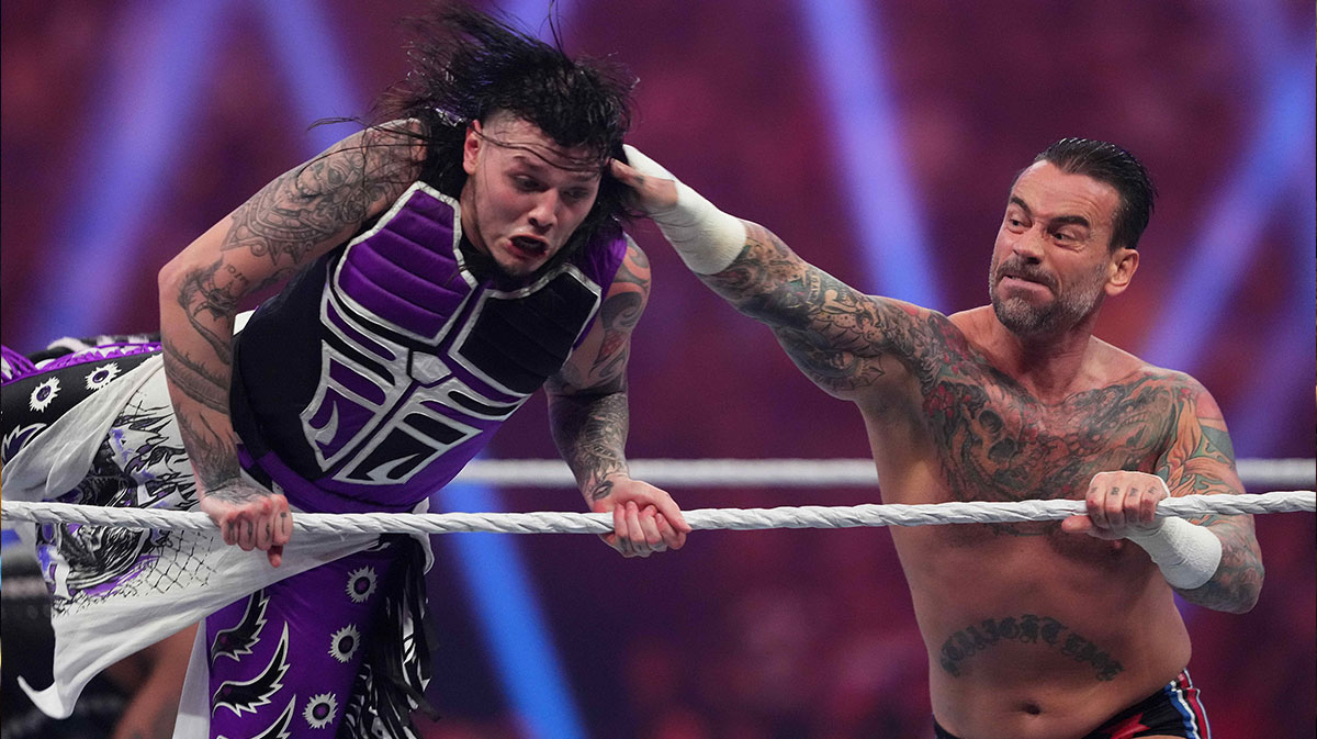 Dominik Mysterio being eliminated by CM Punk at the 2024 WWE Royal Rumble.
