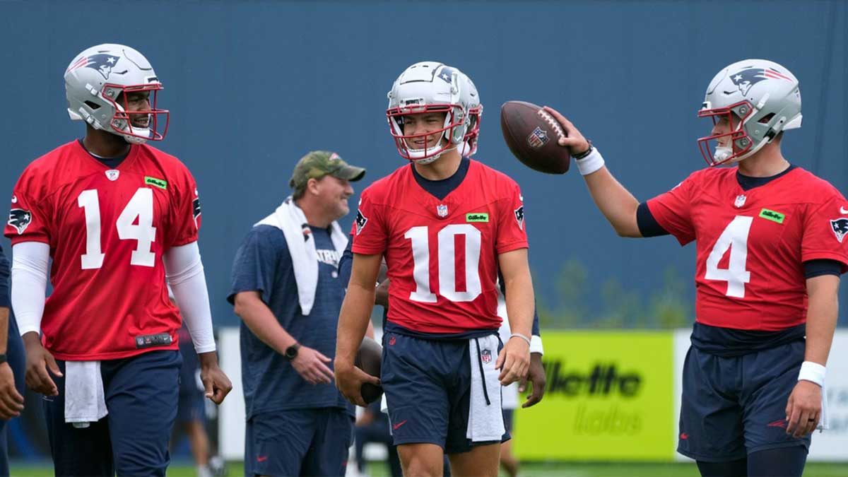 New England Patriots quarterbacks Jacoby Brissett, Drake Maye, and Bailey Zappe during first day of training camp Wednesday morning.