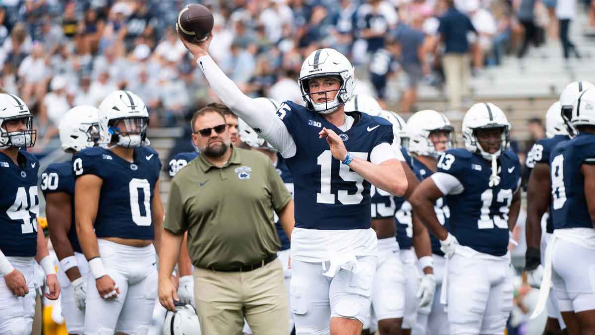 Penn State quarterback Drew Allar (15) warms up before an NCAA football game against Kent State