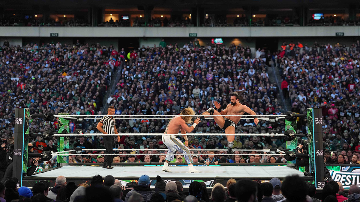 Drew McIntyre delivering a Claymore to Seth Rollins at WrestleMania XL.