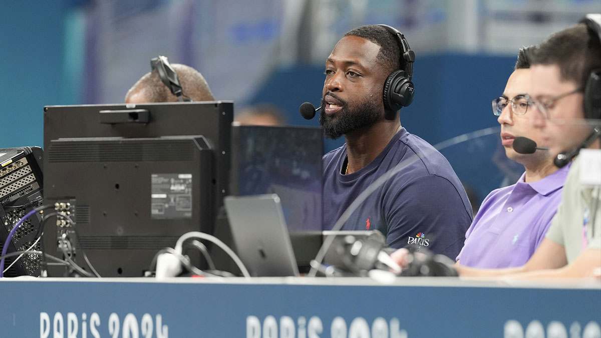 Dwyane Wade looks on from the media bench during the first half between Canada and Greece during the Paris 2024 Olympic Summer Games at Stade Pierre-Mauroy. 