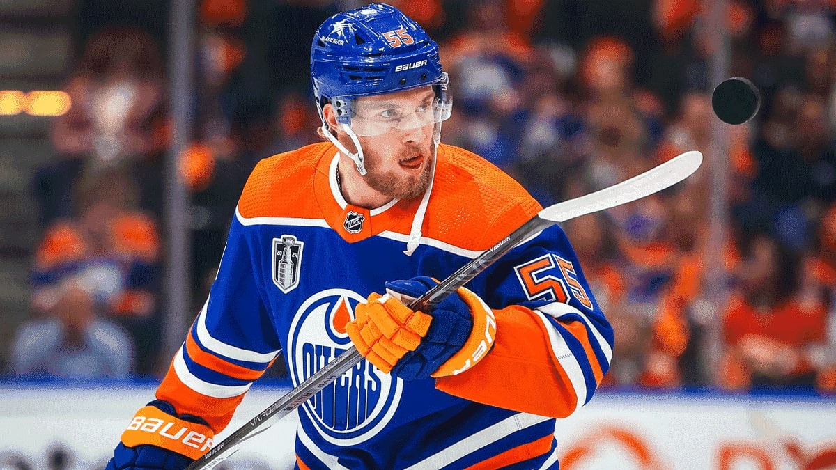 Edmonton Oilers left wing Dylan Holloway (55) controls the puck during the warmup period against the Florida Panthers in game six of the 2024 Stanley Cup Final at Rogers Place.