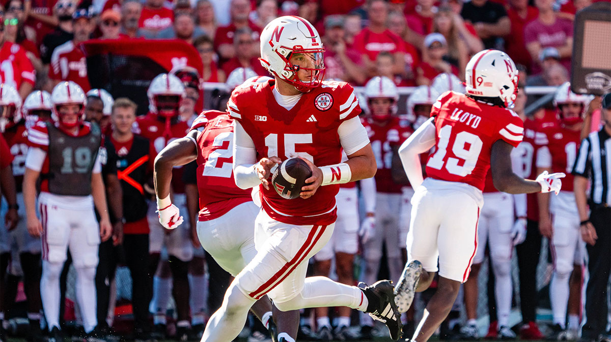 Nebraska Cornhuskers quarterback Dylan Raiola (15) rolls out to pass against the UTEP Miners during the third quarter at Memorial Stadium.
