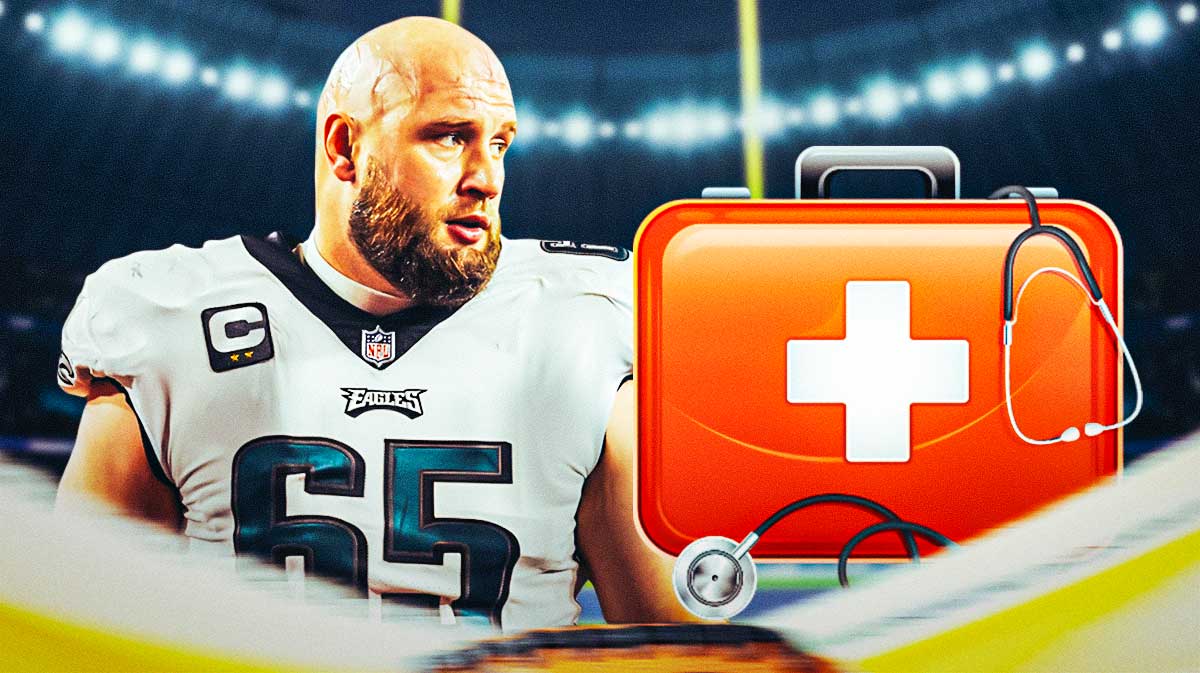 Lane Johnson with a first aid kit near him.