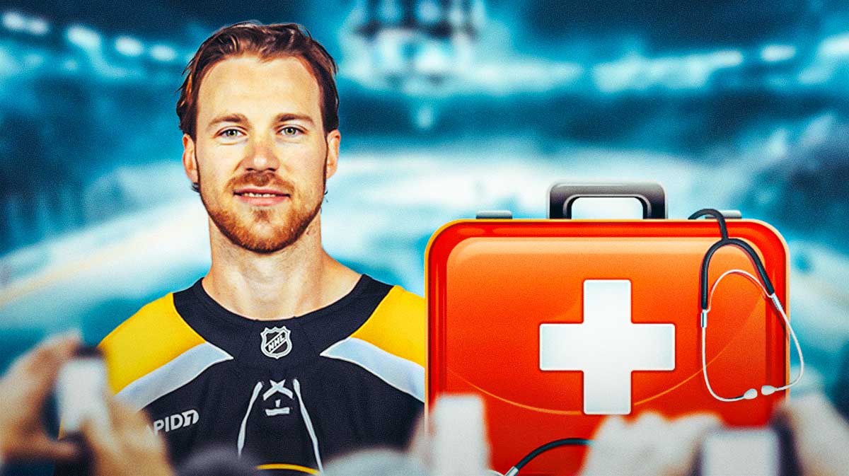 Elias Lindholm in a Boston Bruins jersey with an injury kit in front of him and a bunch of the big eyes emojis in the background