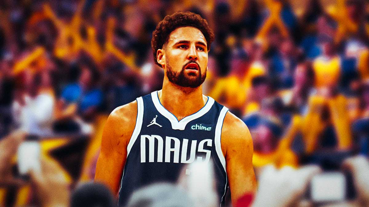 Klay Thompson in Mavericks uniform, surrounded by angry Warriors fans or Warriors fans booing