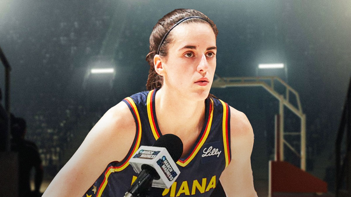 Indiana Fever guard Caitlin Clark with a microphone in her hand, while she is in a broadcast booth.