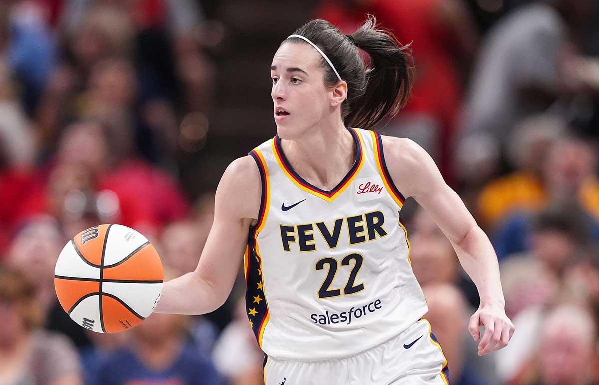 Indiana Fever guard Caitlin Clark (22) rushes up the court Friday, July 12, 2024, during the game at Gainbridge Fieldhouse in Indianapolis. The Indiana Fever defeated the Phoenix Mercury, 95-86.