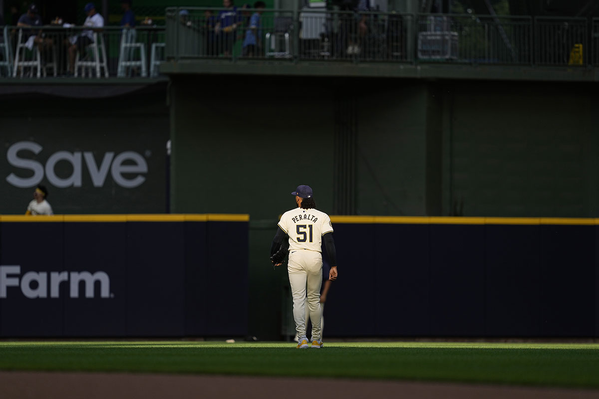 Milwaukee Brewers pitcher Freddy Peralta (51) walks out to the bullpen during warnups prior to the game against the Texas Rangers at American Family Field.