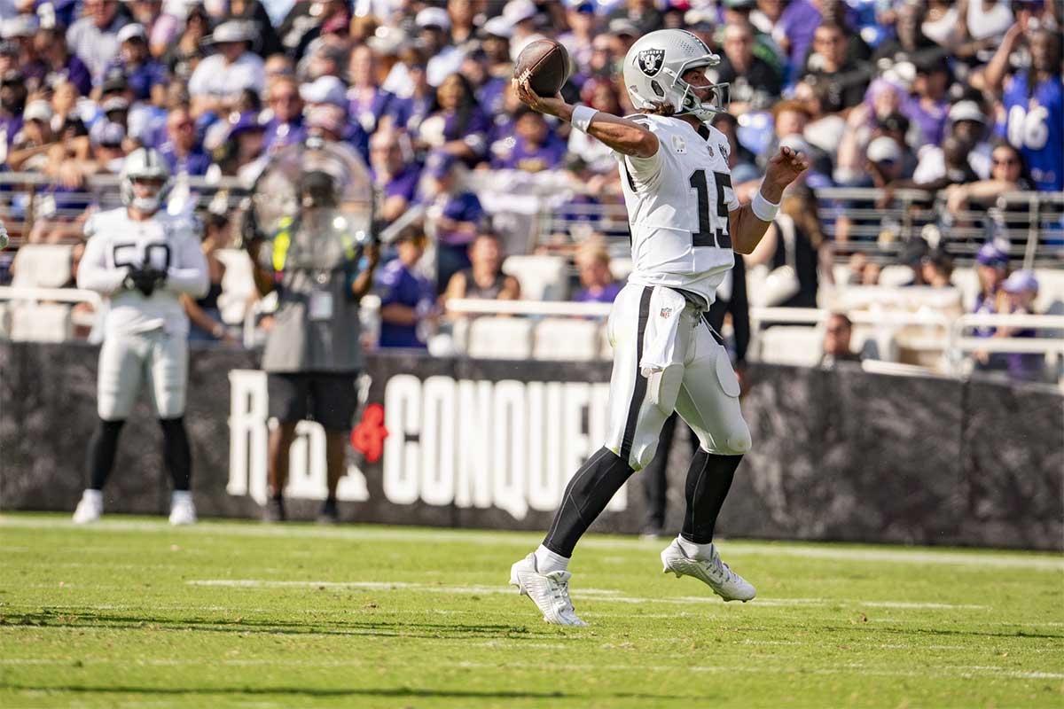 Sep 15, 2024; Baltimore, Maryland, USA; dLas Vegas Raiders quarterback Gardner Minshew (15) throws on the run uring the second half against the Baltimore Ravens at M&T Bank Stadium.