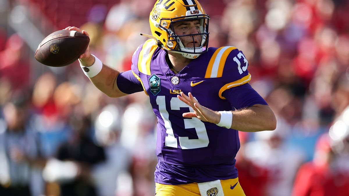 LSU Tigers quarterback Garrett Nussmeier (13) throws a pass against the Wisconsin Badgers in the third quarter during the ReliaQuest Bowl at Raymond James Stadium.