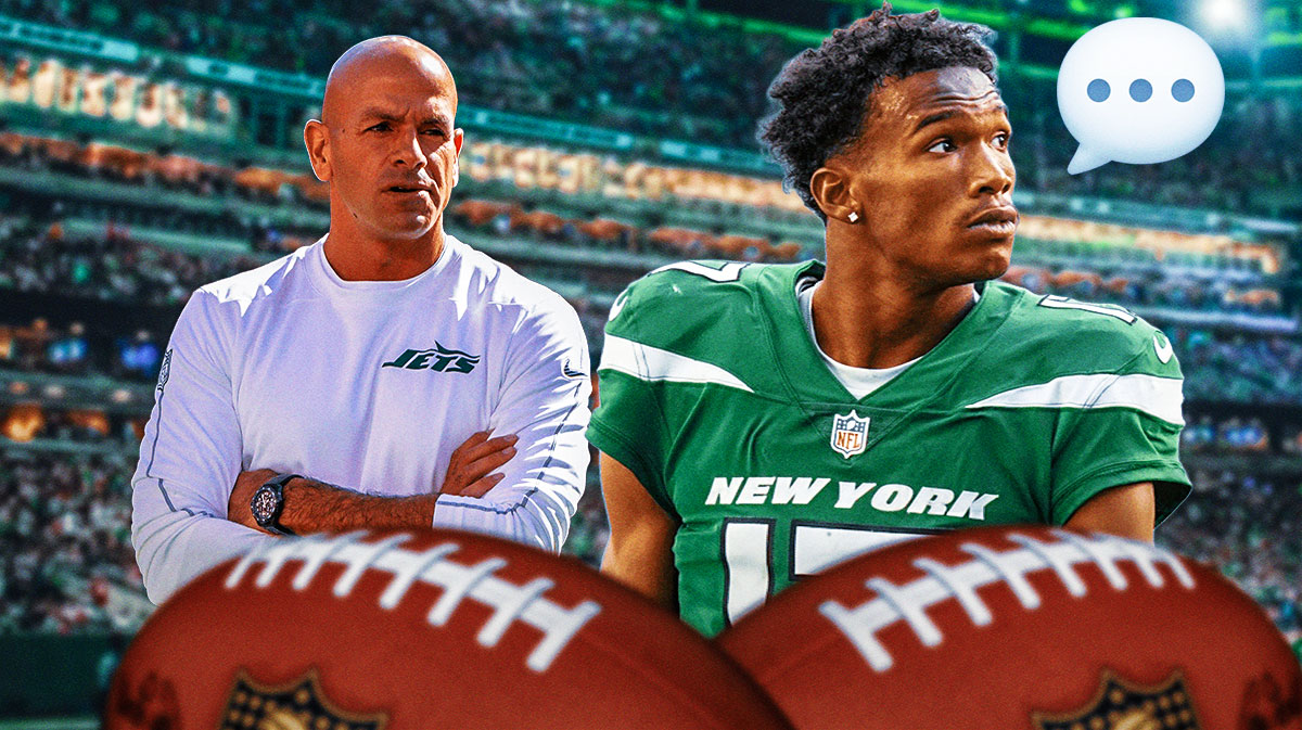 New York Jets WR Garrett Wilson with head coach Robert Saleh. Wilson has a speech bubble with the three dots emoji inside. There is also a logo for the New York Jets.