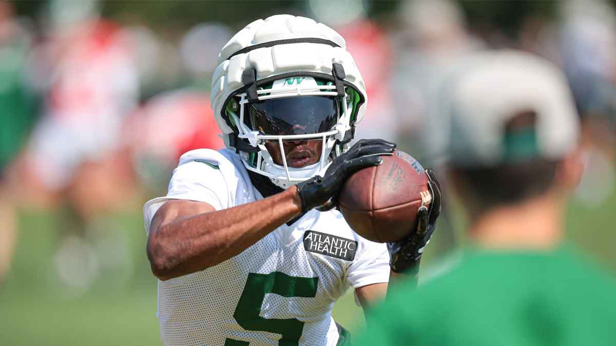 New York Jets wide receiver Garrett Wilson (5) catches the ball during a drill during training camp at Atlantic Health Jets Training Center.