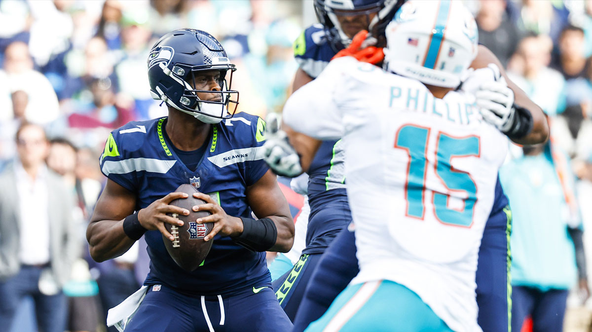 Seattle Seahawks quarterback Geno Smith (7) looks to pass against the Miami Dolphins during the fourth quarter at Lumen Field.