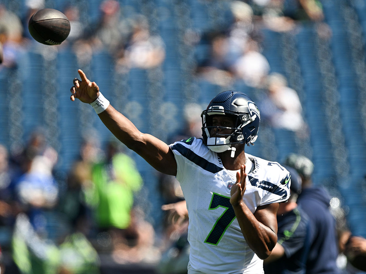 Seattle Seahawks quarterback Geno Smith (7) throws the ball before a game against the New England Patriots at Gillette Stadium.
