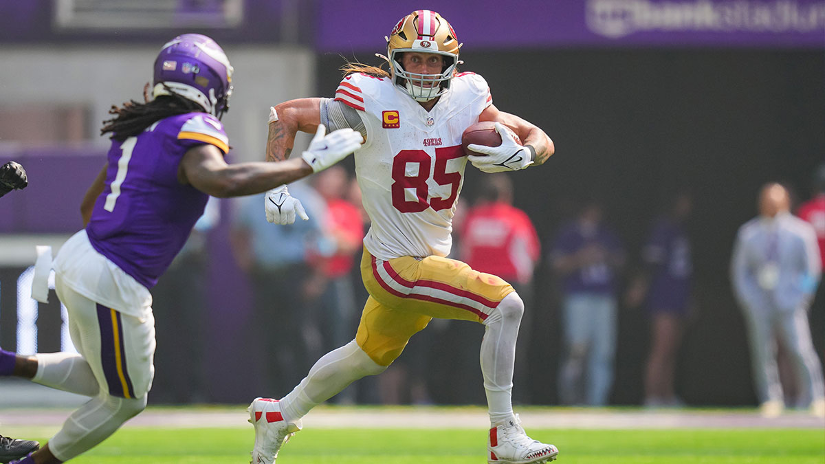 San Francisco 49ers tight end George Kittle (85) runs after the catch against the Minnesota Vikings in the second quarter at U.S. Bank Stadium.