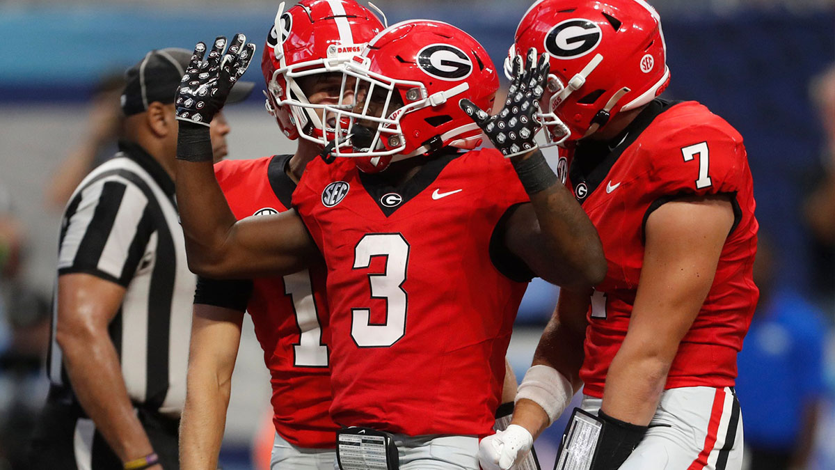 Georgia running back Nate Frazier (3) celebrates after scoring a touchdown during the second half of the NCAA Aflac Kickoff Game against Clemson in Atlanta, on Saturday, Aug. 31, 2024.