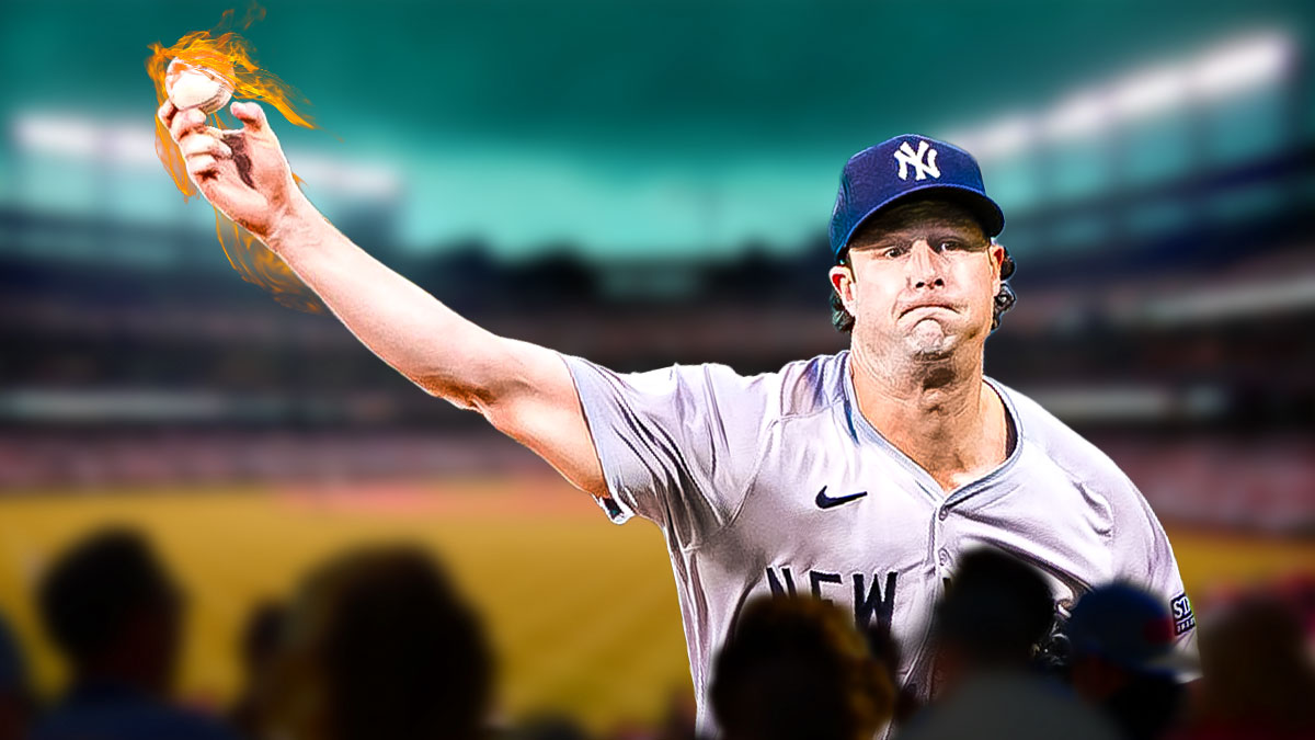 Gerrit Cole pitching in a New York Yankees uniform with the ball in his hand on fire as Cole pitched a hot game for the Yankees Friday against the A's as the Yankees get ready for the playoffs.
