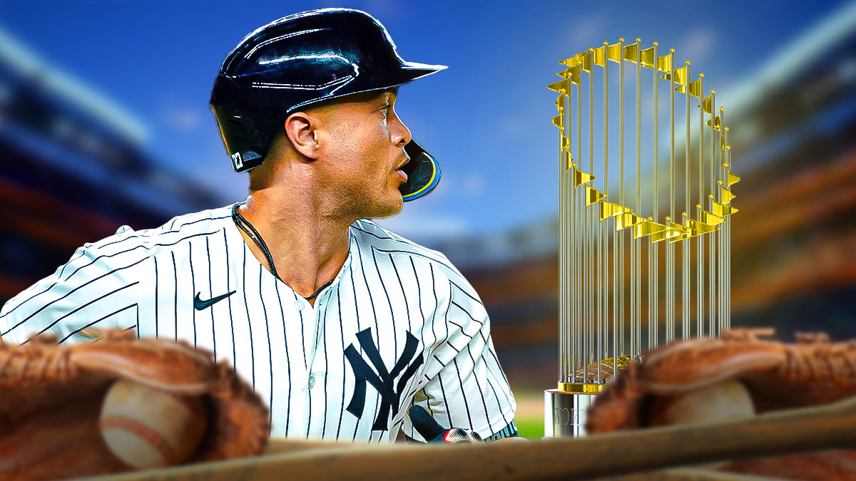 Yankees' Giancarlo Stanton with an eye towards the World Series trophy, with caption below: WE'RE COMING