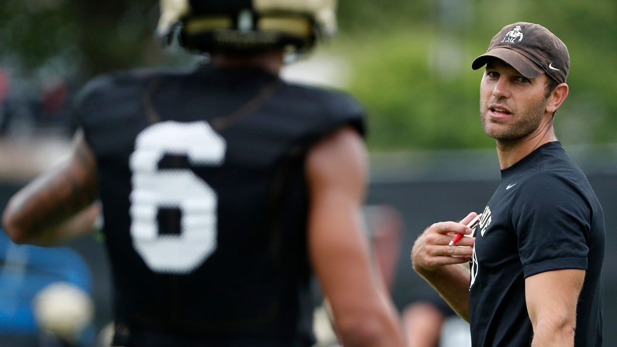 Purdue Boilermakers wide receiver Arhmad Branch (6) talks to Purdue Boilermakers offensive coordinator Graham Harrell Thursday, Aug. 1, 2024, during Purdue football practice at Bimel Outdoor Practice Complex in West Lafayette, Ind.
