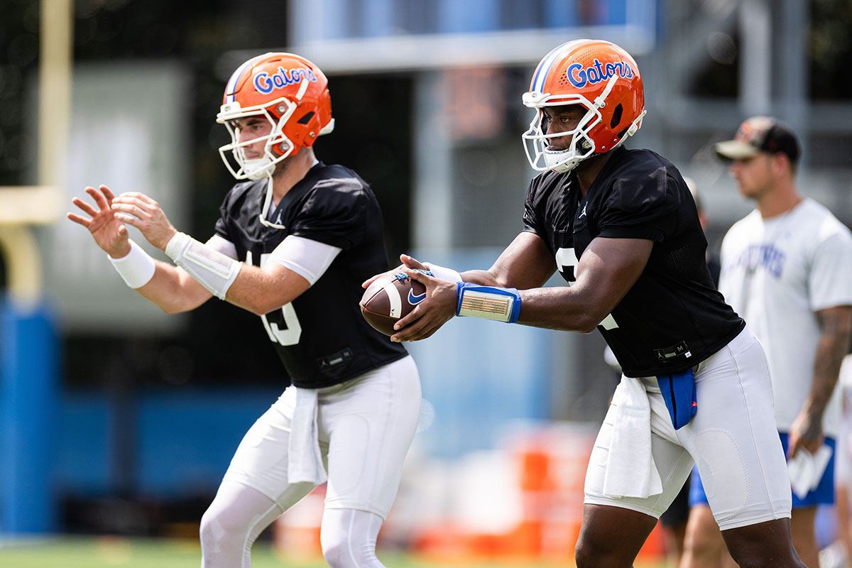 Florida Gators quarterback DJ Lagway (2) and Florida Gators quarterback Graham Mertz (15) participate in a drill during fall football practice at Heavener Football Complex at the University of Florida in Gainesville, FL on Thursday, August 1, 2024.