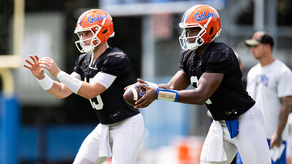 Florida Gators quarterback DJ Lagway (2) and Florida Gators quarterback Graham Mertz (15) participate in a drill during fall football practice at Heavener Football Complex at the University of Florida.