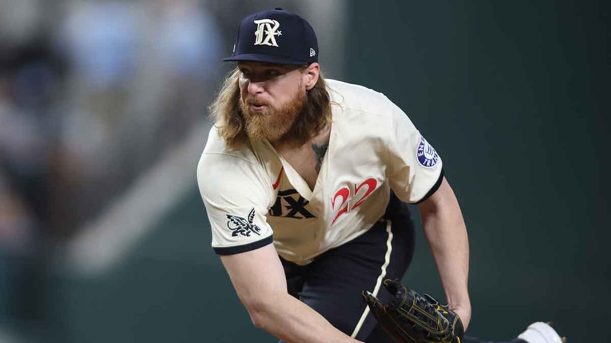 Texas Rangers pitcher Jon Gray (22) throws a pitch against the Oakland Athletics in the third inning at Globe Life Field.