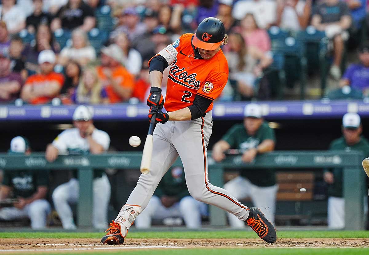 Aug 31, 2024; Denver, Colorado, USA; Baltimore Orioles shortstop Gunnar Henderson (2) singles in the fourth inning against the Colorado Rockies at Coors Field. 