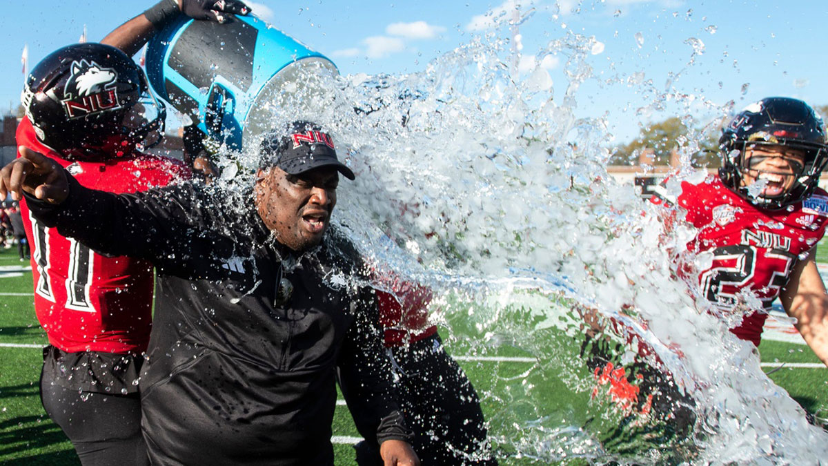 Camellia Bowl: Northern Illinois head coach Thomas Hammock gets doused after the Huskies defeated Arkansas State.