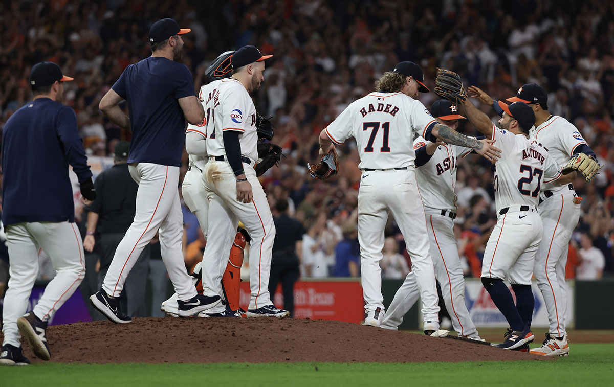 Houston Astros relief pitcher Josh Hader (71) , catcher Yainer Diaz (21) third baseman Alex Bregman (2) and first baseman Victor Caratini (17) celebrate defeating the Seattle Mariners and winning the American League West at Minute Maid Park