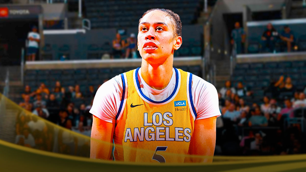 LA Sparks player Dearica Hamby with the LA Sparks arena in the background, season