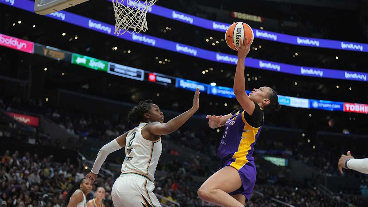 LA Sparks forward Dearica Hamby (5) shoots the ball against New York Liberty forward Kennedy Burke (2) in the second half at Crypto.com Arena.