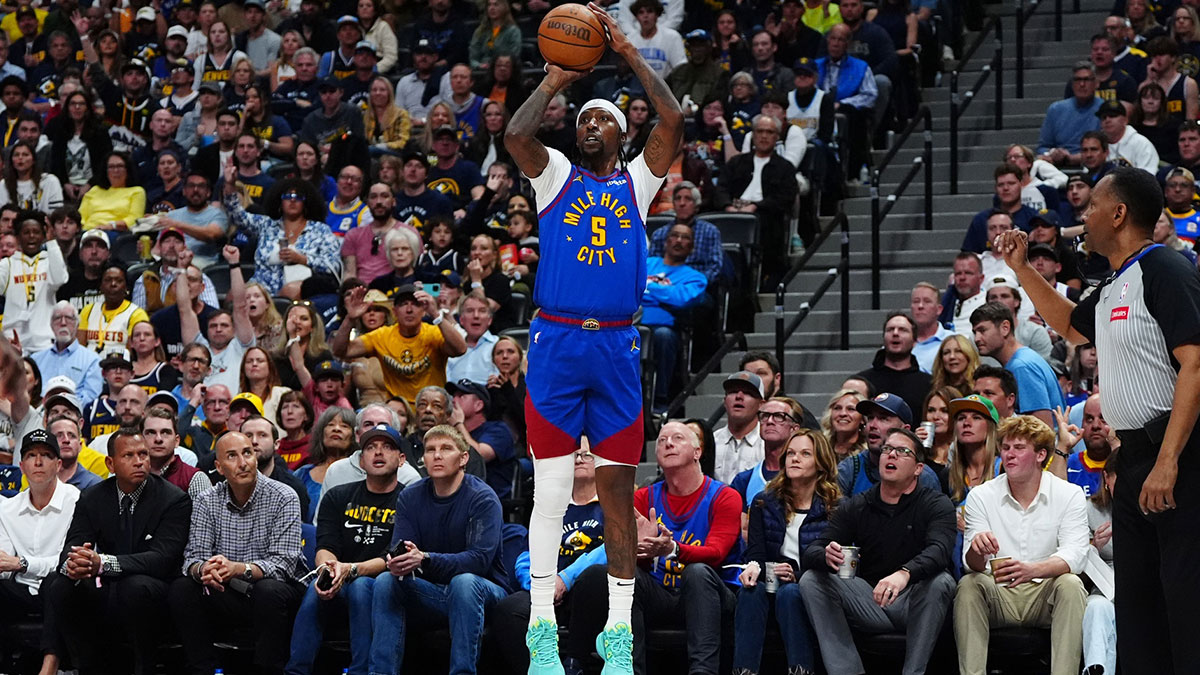 Denver Nuggets guard Kentavious Caldwell-Pope (5) shoots the ball in the second half against the Minnesota Timberwolves in Game 1 of the second round of the 2024 NBA Playoffs at Ball Arena.