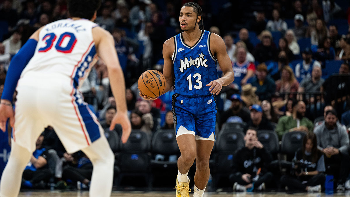 Orlando Magic guard Jett Howard (13) dribbles the ball past Philadelphia 76ers small forward Furkan Korkmaz (30) in the fourth quarter at KIA Center.